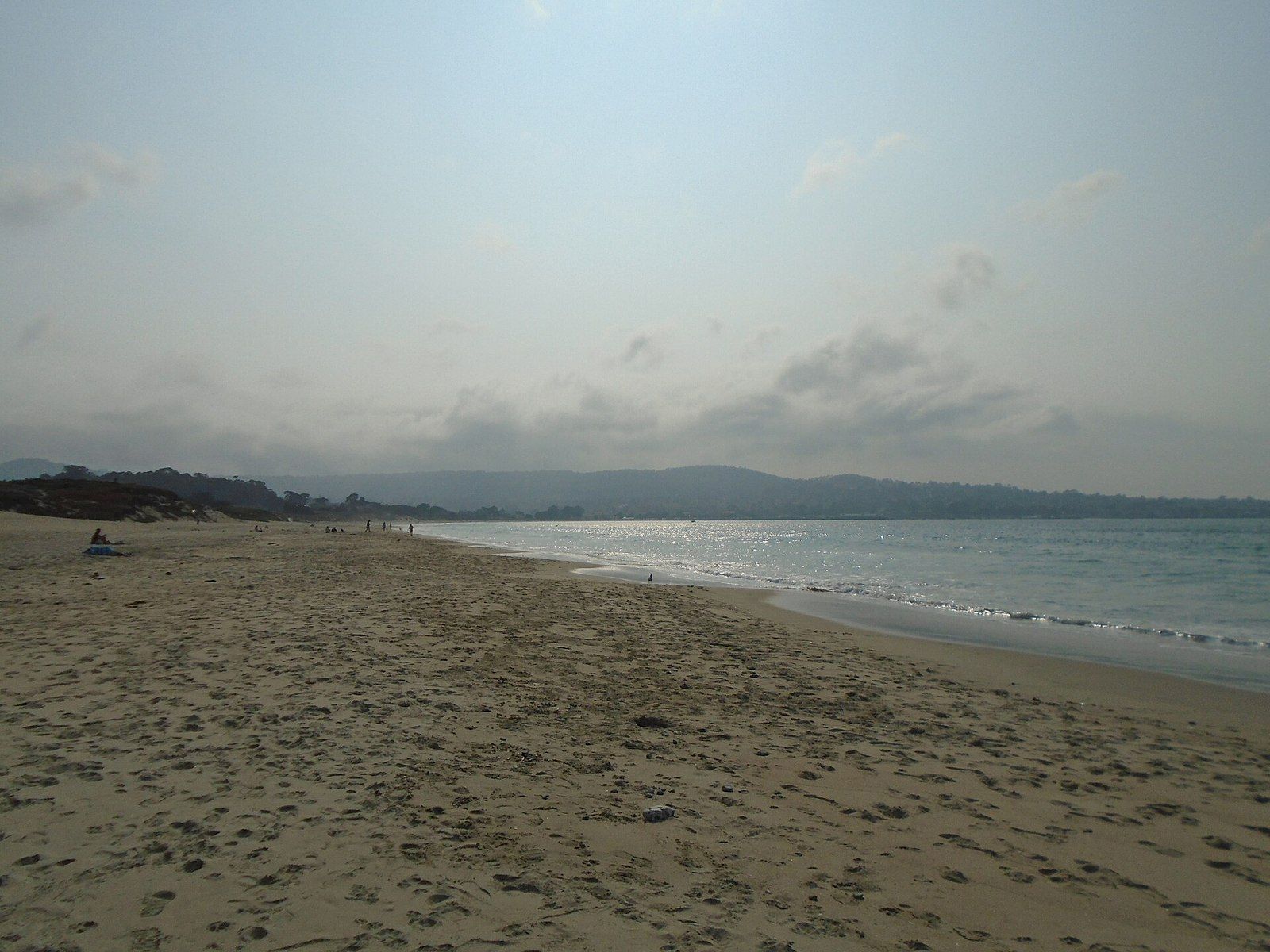 The wide sandy shore of Monterey State Beach on Monterey Bay