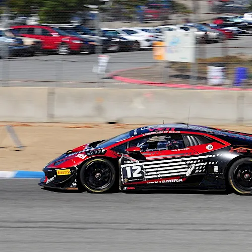 A race car on the track at WeatherTech Raceway Laguna Seca